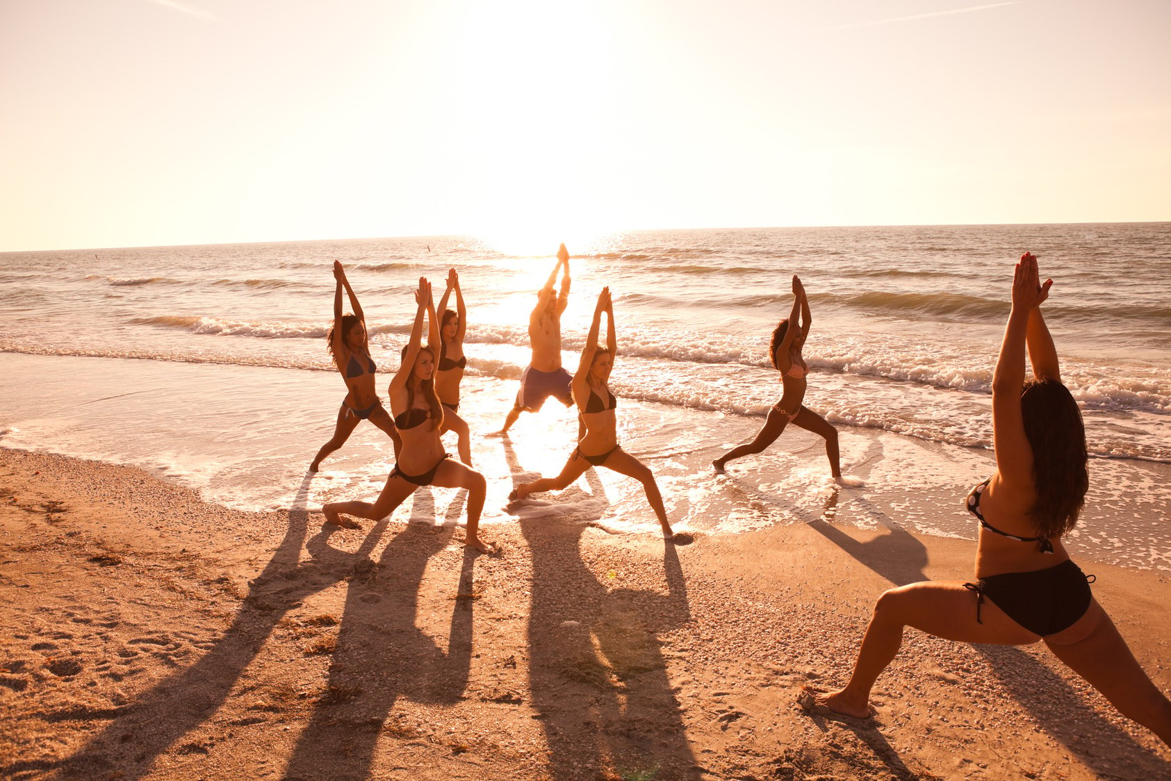 Yoga class on the beach